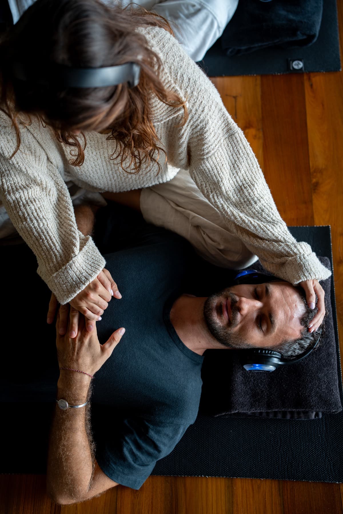 A guided breathwork session in progress, headphones on